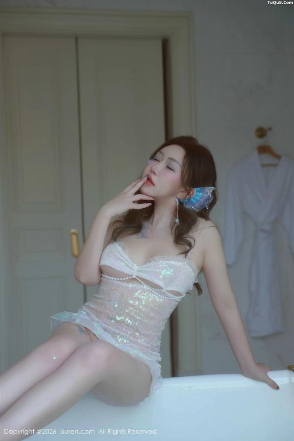   [XiuRen]高清写真图 2026.01.30 No.11298 小薯条nienie 性感情趣服饰第44张图片